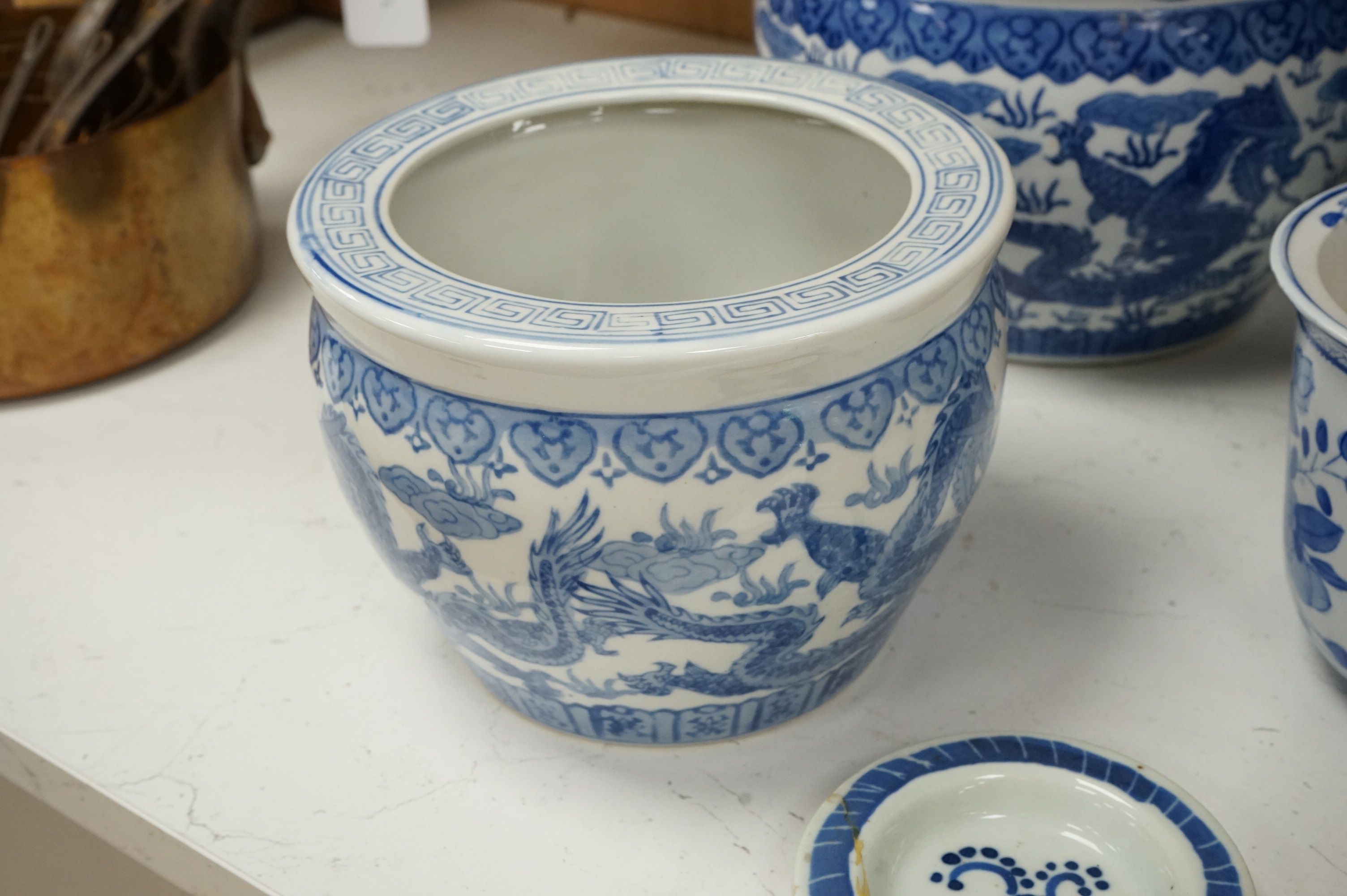 A large collection of various Chinese and Japanese ceramics and collectables to include a 19th century white glazed porcelain figure of Guanyin, largest 30.5cm